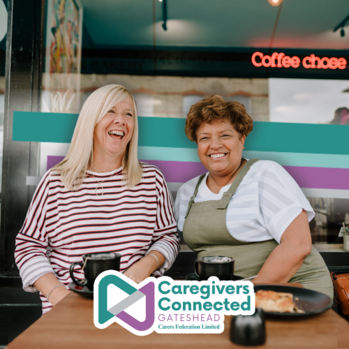 Two women enjoying a hot beverage.