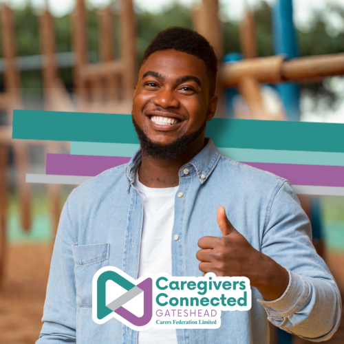 Photograph of a man giving a thumbs up.