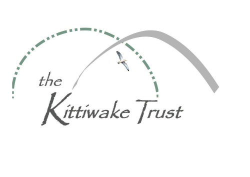 Grey / white logo saying Kittiwake Trust and arched barbed wire