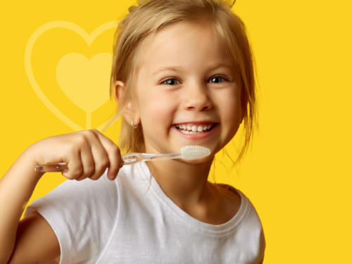 a young girl brushing her teeth 