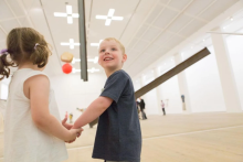 Children create art with parents 