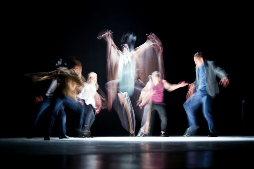 artistically blurred image of dancers 