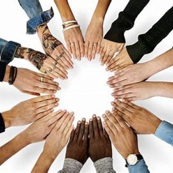 Image of eight people from diverse backgrouds, making a circle with their hands