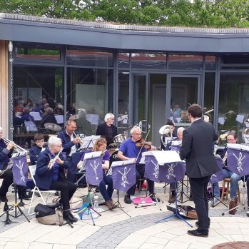 Band playing outside of Land of Oak & Iron Heritage Centre