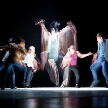 artistically blurred image of dancers 
