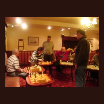 Group of people playing chess