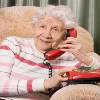 Photo of a lady receiving a telephone call