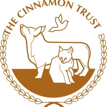 Brown on white circular logo with The Cinnamon Trust written above and a dog, cat an bird in the centre.