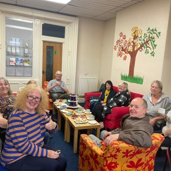 A group of carers relaxing together at Gateshead Carers Association 